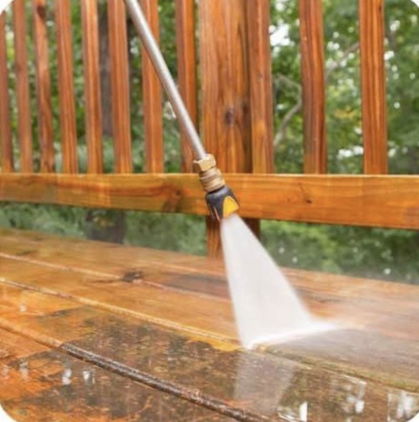 Pressure washing a wooden deck